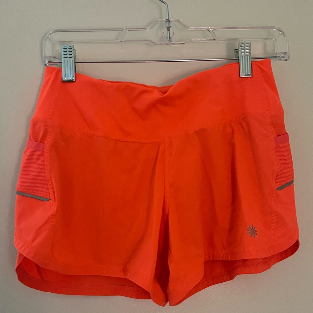 NEON ORANGE ATHLETIC SHORTS ATHLETA- like new